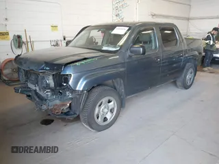 2007 Honda Ridgeline RT with VIN 2HJYK16247H551318, listed as a IAAI auction lot 41833976 with 155,303 mi miles. Bid and sale history available at carsss.com. Image 2.