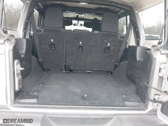 2019 Jeep Wrangler Unlimited Sport with VIN 1C4HJXDG4KW518726, listed as a IAAI auction lot 41597892 with 68,842 mi miles. Bid and sale history available at carsss.com. Image 8.