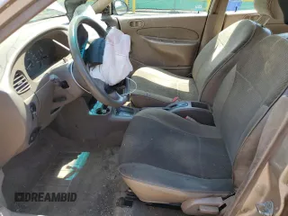 1998 Ford Escort SE with VIN 1FAFP13P7WW266180, listed as a Copart auction lot 61625005 with 143,982 mi miles and Salvage title. Bid and sale history available at DreamBid. Image 7.