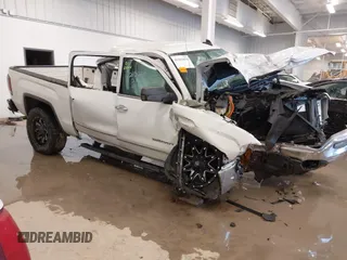 2018 GMC Sierra 1500 SLT z VIN 3GTU2NEC0JG590791, wystawiony jako IAAI lot #41565076 z przebiegiem Nie podano mil oraz . Historia ofert i sprzedaży dostępna na DreamBid. Obrazek 1.