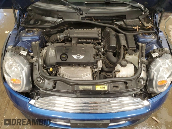 2013 MINI Hardtop with VIN WMWSU3C53DT681665, listed as a Copart auction lot 60752355 with 104,874 mi miles and Salvage title. Bid and sale history available at DreamBid. Image 11.