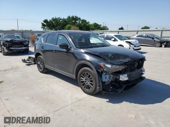 2021 Mazda CX-5 Touring z VIN JM3KFBCM8M0321766, wystawiony jako Copart lot #52845085 z przebiegiem 115 627 mil mil oraz Szkody całkowita. Historia ofert i sprzedaży dostępna na DreamBid. Obrazek 4.