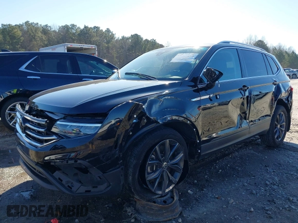 2023 Volkswagen Tiguan SE z VIN 3VVMB7AX7PM032629, wystawiony jako IAAI lot #41441468 z przebiegiem 52 518 mil mil oraz . Historia ofert i sprzedaży dostępna na DreamBid. Obrazek 6.