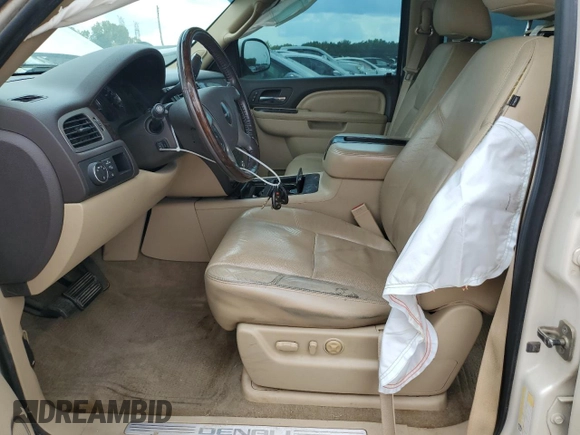 2011 GMC Yukon Denali with VIN 1GKS1EEFXBR313625, listed as a Copart auction lot 72634294 with 129,834 mi miles and Salvage Title. Bid and sale history available at carsss.com. Image 7.