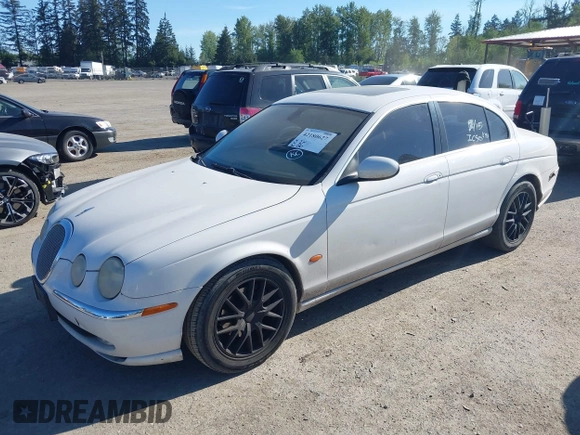 2004 Jaguar S-Type with VIN SAJEA01U74HM96220, listed as a IAAI auction lot 42180627 with 160,015 mi miles and . Bid and sale history available at DreamBid. Image 2.
