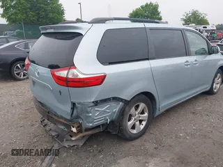 2015 Toyota Sienna LE AAS with VIN 5TDKK3DC4FS663876, listed as a IAAI auction lot 42155091 with 82,602 mi miles and . Bid and sale history available at DreamBid. Image 4.