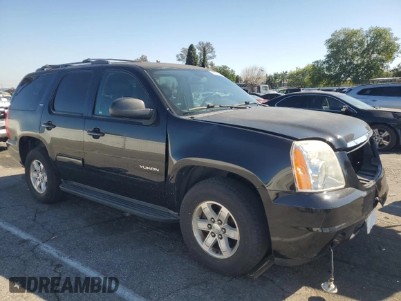 2014 GMC Yukon SLT with VIN 1GKS1CE07ER208318, listed as a Copart auction lot 46097405 with 98,882 mi miles and Salvage Title. Bid and sale history available at carsss.com. Image 4.