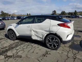 2020 Toyota C-HR LE with VIN JTNKHMBX7L1077252, listed as a Copart auction lot 51486305 with 64,213 mi miles and Salvage Title. Bid and sale history available at DreamBid. Image 2.