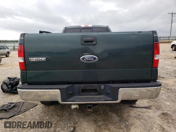 2005 Ford F-150 XL with VIN 1FTPF12585NA63952, listed as a Copart auction lot 74300474 with 98,379 mi miles and Salvage Title. Bid and sale history available at carsss.com. Image 10.