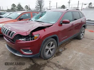 2020 Jeep Cherokee Limited with VIN 1C4PJLDB0LD570909, listed as a IAAI auction lot 41293813 with 61,492 mi miles. Bid and sale history available at carsss.com. Image 2.