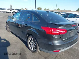 2015 Ford Focus SE with VIN 1FADP3F22FL306055, listed as a IAAI auction lot 41966475 with 139,228 mi miles. Bid and sale history available at carsss.com. Image 3.