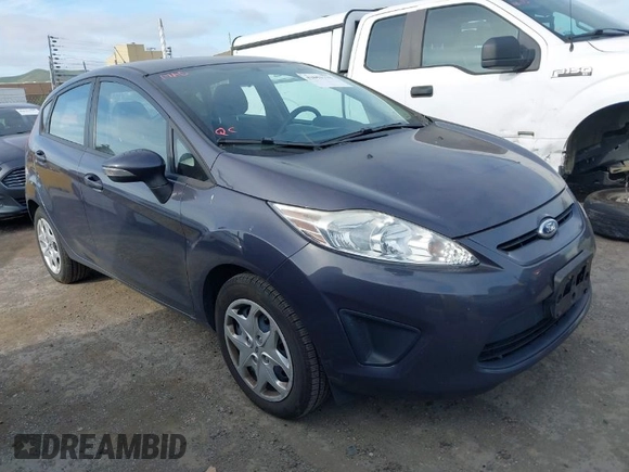 2013 Ford Fiesta SE with VIN 3FADP4EJ6DM205708, listed as a IAAI auction lot 42051721 with 139,143 mi miles. Bid and sale history available at carsss.com. Image 1.