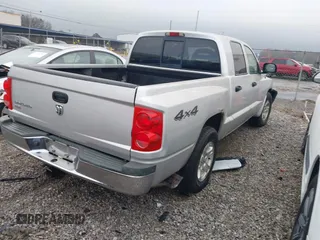 2005 Dodge Dakota SLT with VIN 1D7HW48N55S253745, listed as a IAAI auction lot 41116435 with 183,241 mi miles. Bid and sale history available at carsss.com. Image 4.