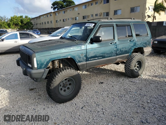 1998 Jeep Cherokee Country with VIN 1J4FT78S8XL520854, listed as a Copart auction lot 79304214 with 111,674 mi miles and Clean title. Bid and sale history available at DreamBid. Image 1.