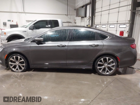 2015 Chrysler 200 C with VIN 1C3CCCCG1FN551259, listed as a IAAI auction lot 41221979 with 98,055 mi miles and . Bid and sale history available at carsss.com. Image 14.