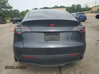 2024 Tesla Model Y z VIN 7SAYGDED4RA331714, wystawiony jako Copart lot #57043915 z przebiegiem Nie podano mil oraz Szkoda całkowita • Salvage title. Historia ofert i sprzedaży dostępna na DreamBid. Obrazek 6.