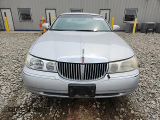1998 Lincoln Town Car Cartier z VIN 1LNFM83W6WY649580, wystawiony jako Copart lot #59198865 z przebiegiem 253 735 mil mil oraz Czysty tytuł • Clean title. Historia ofert i sprzedaży dostępna na DreamBid. Obrazek 5.