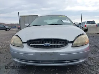 2003 Ford Taurus SES Standard with VIN 1FAFP55253A229632, listed as a IAAI auction lot 41867986 with 154,092 mi miles. Bid and sale history available at carsss.com. Image 6.
