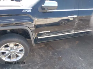 2014 GMC Sierra 1500 Denali z VIN 3GTU2WEC2EG302474, wystawiony jako IAAI lot #41881222 z przebiegiem 197 221 mil mil oraz . Historia ofert i sprzedaży dostępna na DreamBid. Obrazek 6.
