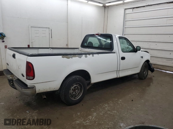 2000 Ford F-150 XL with VIN 1FTRF17L7YNB52822, listed as a Copart auction lot 43421495 with 103,753 mi miles and Salvage title. Bid and sale history available at DreamBid. Image 3.