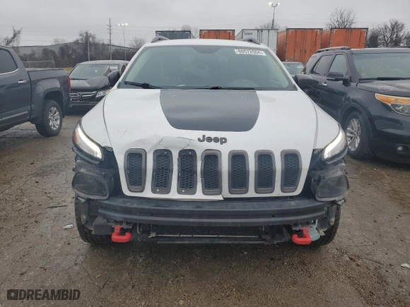 2015 Jeep Cherokee Trailhawk with VIN 1C4PJMBS9FW698857, listed as a Copart auction lot 86572504 with 143,919 mi miles and Clean Title. Bid and sale history available at carsss.com. Image 5.