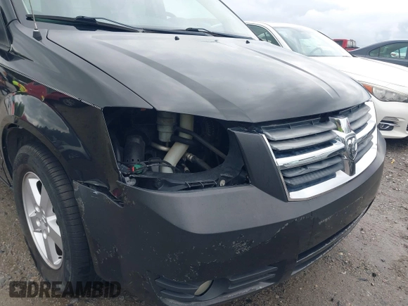 2010 Dodge Grand Caravan SXT with VIN 2D4RN5D11AR154526, listed as a IAAI auction lot 42009099 with 239,343 mi miles and . Bid and sale history available at DreamBid. Image 6.