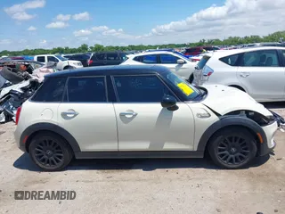 2016 MINI Hardtop 4 Door z VIN WMWXU1C50G2D08848, wystawiony jako IAAI lot #42215256 z przebiegiem 102 643 mil mil oraz . Historia ofert i sprzedaży dostępna na DreamBid. Obrazek 14.