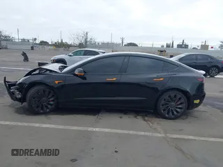 2022 Tesla Model 3 Performance with VIN 5YJ3E1EC3NF248534, listed as a IAAI auction lot 41882694 with 55,415 mi miles and . Bid and sale history available at carsss.com. Image 13.