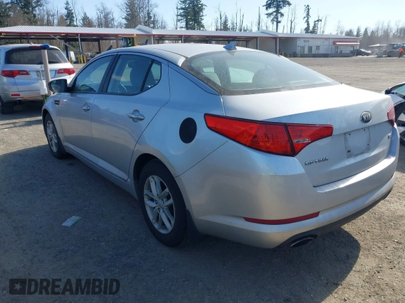2013 Kia Optima LX z VIN KNAGM4A74D5371383, wystawiony jako IAAI lot #41756449 z przebiegiem 133 002 mil mil oraz . Historia ofert i sprzedaży dostępna na DreamBid. Obrazek 3.