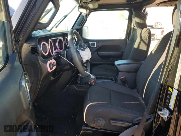 2023 Jeep Wrangler Sport S with VIN 1C4HJXDG5PW615926, listed as a Copart auction lot 84765684 with 23,333 mi miles and Salvage Title. Bid and sale history available at DreamBid. Image 7.