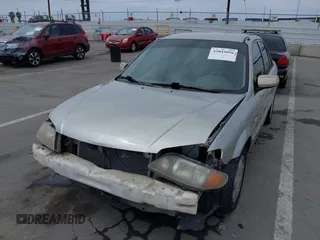 2002 Mazda Protege DX with VIN JM1BJ225121620394, listed as a IAAI auction lot 42043056 with 187,360 mi miles and . Bid and sale history available at DreamBid. Image 6.