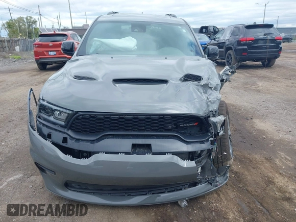 2023 Dodge Durango R/T with VIN 1C4SDJCT5PC551011, listed as a IAAI auction lot 42336477 with 39,754 mi miles and . Bid and sale history available at DreamBid. Image 12.