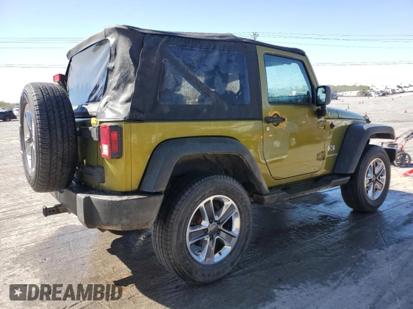 2008 Jeep Wrangler X with VIN 1J4FA24168L609202, listed as a Copart auction lot 52901975 with 165,083 mi miles and Salvage Title. Bid and sale history available at DreamBid. Image 3.