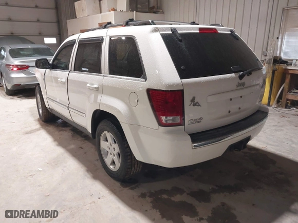 2007 Jeep Grand Cherokee Limited with VIN 1J8HR58217C552426, listed as a IAAI auction lot 41834106 with 130,537 mi miles. Bid and sale history available at carsss.com. Image 3.