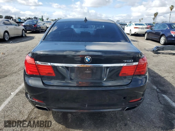 2012 BMW 7 Series 750i with VIN WBAKA8C57CDS99976, listed as a Copart auction lot 45202715 with 152,169 mi miles and Salvage title. Bid and sale history available at DreamBid. Image 6.