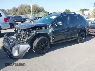 2023 Toyota RAV4 Hybrid XSE with VIN 4T3E6RFV6PU120175, listed as a IAAI auction lot 42499631 with 27,452 mi miles and . Bid and sale history available at DreamBid. Image 2.