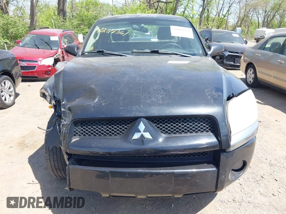 2008 Mitsubishi Raider LS z VIN 1Z7HC22K68S609523, wystawiony jako IAAI lot #42119361 z przebiegiem 154 328 mil mil oraz . Historia ofert i sprzedaży dostępna na DreamBid. Obrazek 12.