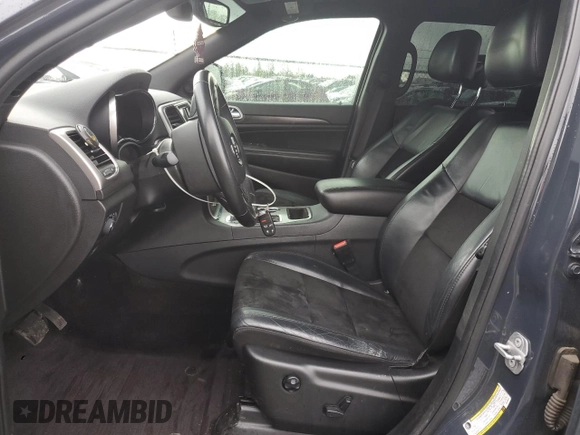 2018 Jeep Grand Cherokee Altitude with VIN 1C4RJFAG5JC219944, listed as a Copart auction lot 52030365 with 99,463 mi miles and Salvage title. Bid and sale history available at DreamBid. Image 7.