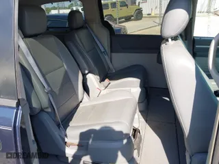 2008 Dodge Grand Caravan SXT with VIN 2D8HN54X68R634845, listed as a IAAI auction lot 42014757 with 237,542 mi miles. Bid and sale history available at carsss.com. Image 8.
