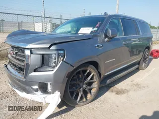 2022 GMC Yukon XL SLT with VIN 1GKS2GKT3NR233736, listed as a IAAI auction lot 37293147 with 27,196 mi miles. Bid and sale history available at carsss.com. Image 2.