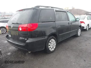 2010 Toyota Sienna CE with VIN 5TDKK4CC6AS343068, listed as a IAAI auction lot 41973330 with 327,086 mi miles. Bid and sale history available at carsss.com. Image 4.