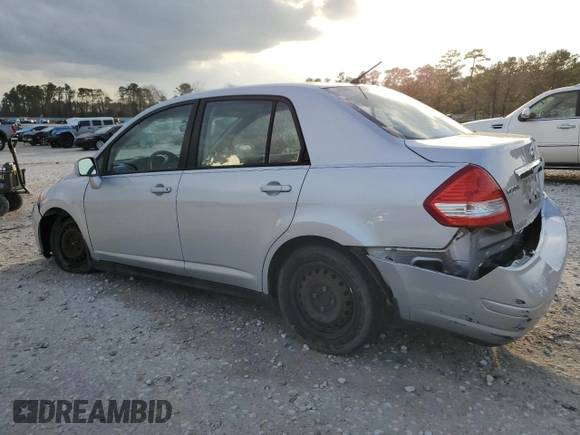 2009 Nissan Versa 1.8 S with VIN 3N1BC11E69L494335, listed as a Copart auction lot 43752905 with 174,521 mi miles and Salvage Title. Bid and sale history available at carsss.com. Image 2.