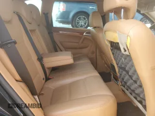 2009 Porsche Cayenne z VIN WP1AA29P99LA09934, wystawiony jako Copart lot #55247505 z przebiegiem 154 322 mil mil oraz Szkoda całkowita • Salvage title. Historia ofert i sprzedaży dostępna na DreamBid. Obrazek 11.