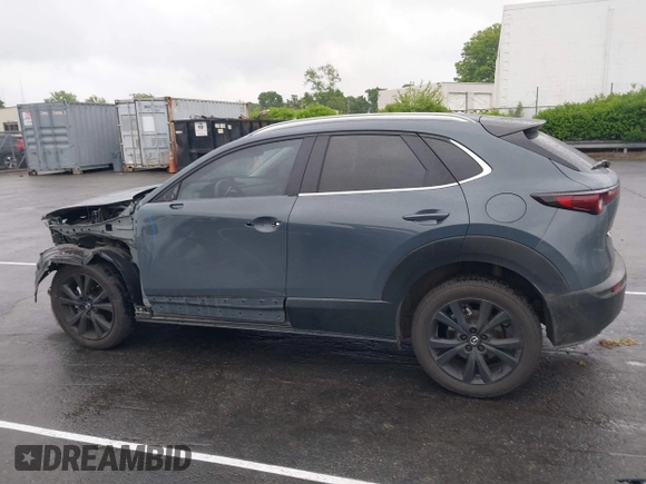 2023 Mazda CX-30 S Carbon Edition with VIN 3MVDMBCM9PM574358, listed as a IAAI auction lot 42105931 with 55,975 mi miles and . Bid and sale history available at DreamBid. Image 15.