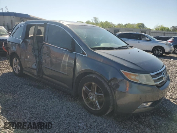 2012 Honda Odyssey Touring with VIN 5FNRL5H93CB028282, listed as a Copart auction lot 52322015 with 206,582 mi miles and Salvage Title. Bid and sale history available at carsss.com. Image 4.