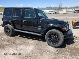 2023 Jeep Wrangler Sahara with VIN 1C4JJXP65PW661194, listed as a Copart auction lot 55729925 with 24,264 mi miles and Clean Title. Bid and sale history available at DreamBid. Image 4.