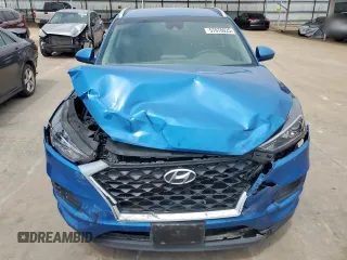 2019 Hyundai Tucson Value with VIN KM8J33A48KU913336, listed as a Copart auction lot 57070025 with 83,037 mi miles and Salvage title. Bid and sale history available at DreamBid. Image 5.