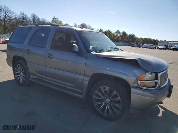 2005 GMC Yukon Denali with VIN 1GKEK63U55J190594, listed as a Copart auction lot 71193854 with 157,932 mi miles and Salvage Title. Bid and sale history available at carsss.com. Image 4.