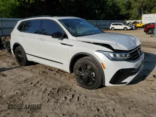 2023 Volkswagen Tiguan SE R-Line Black с VIN 3VVCB7AX6PM012271, выставлен на аукционе Copart как лот 54506175 с пробегом 28 168 миль миль и Списание • Salvage title. История ставок и продаж доступна на DreamBid. Изображение 4.
