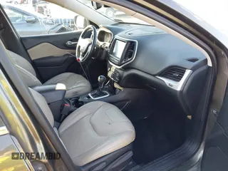 2015 Jeep Cherokee Limited with VIN 1C4PJMDS8FW708226, listed as a IAAI auction lot 41919231 with 188,276 mi miles and . Bid and sale history available at DreamBid. Image 5.